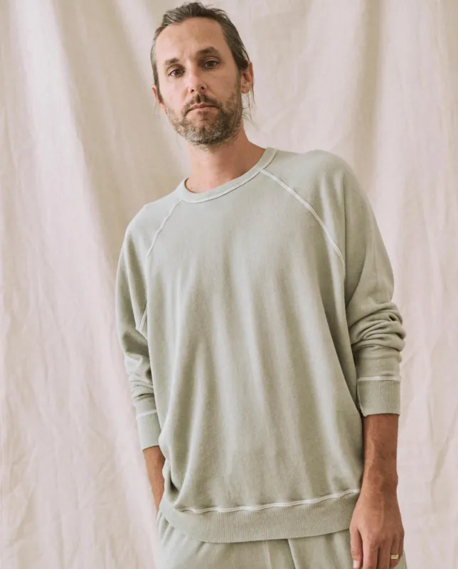 The Men's College Sweatshirt. -- Seafoam sold by THE GREAT.