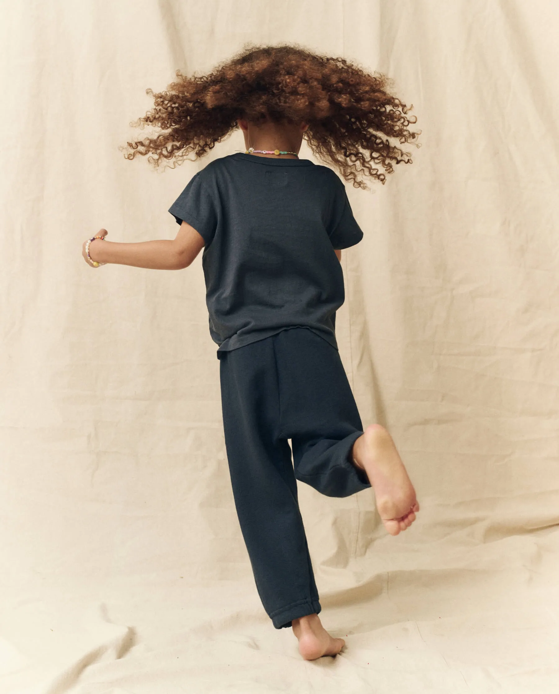 The Little Stadium Sweatpant. Solid -- True Navy sold by THE GREAT. product image thumbnail 2