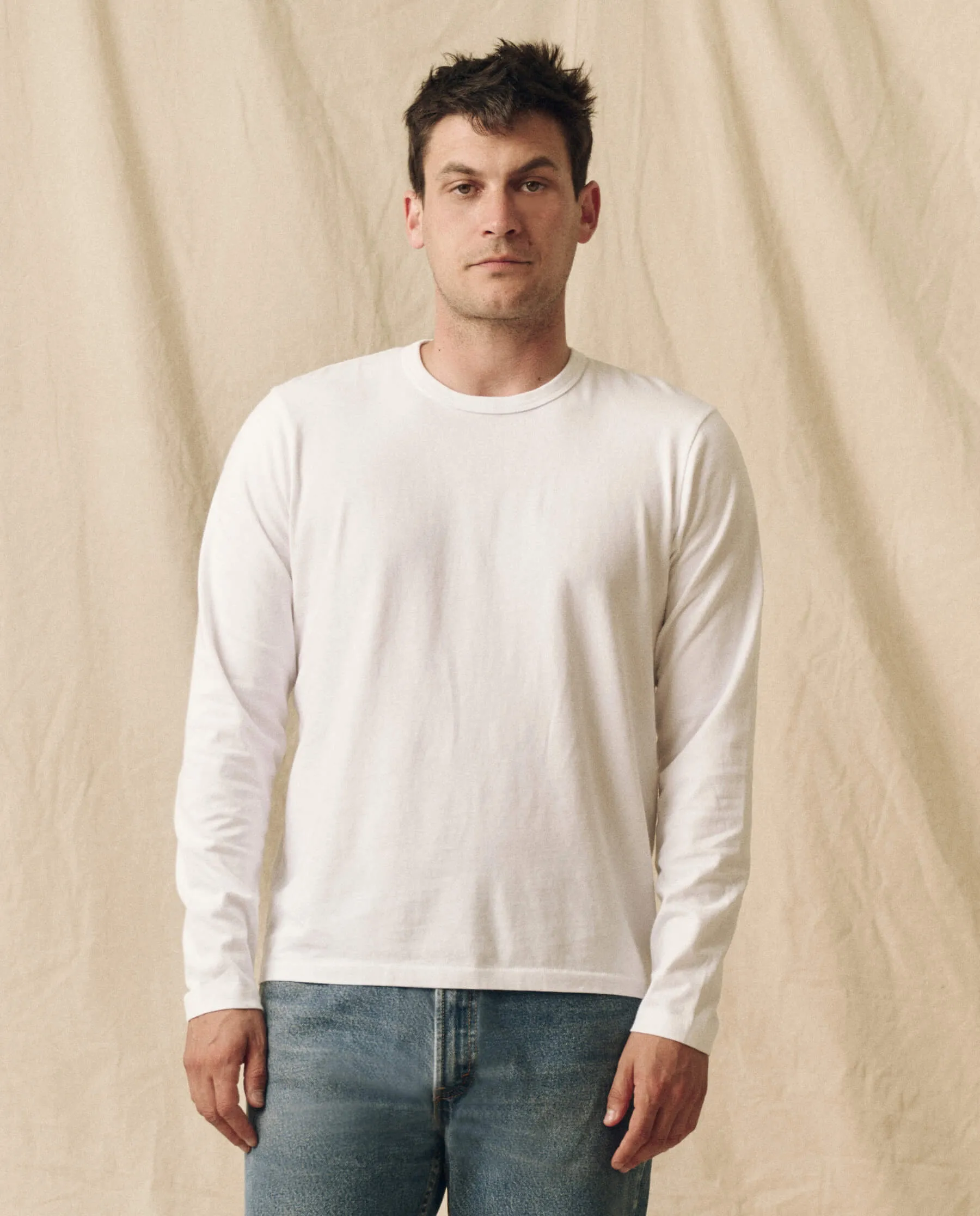The Men's Pure Knits Long Sleeve Slim Crew. -- True White sold by THE GREAT.