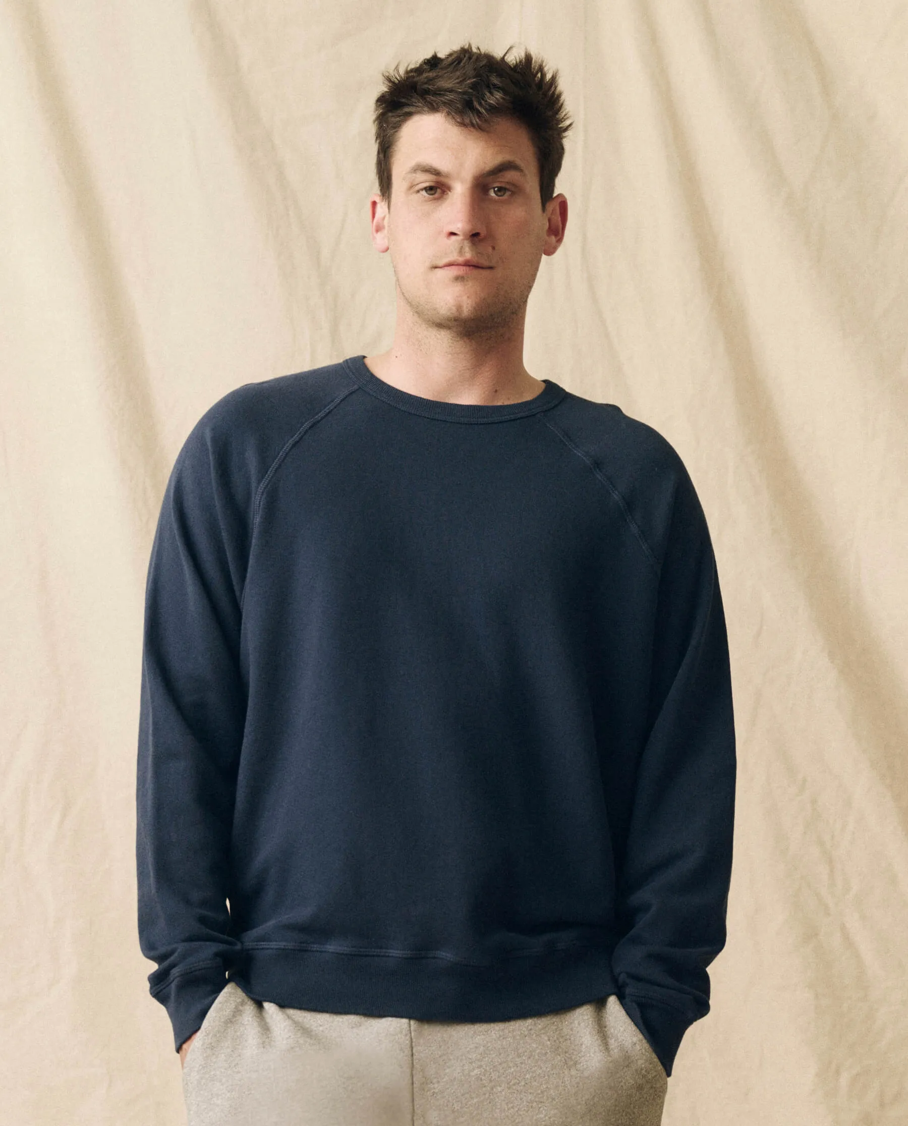 The Men's College Sweatshirt. -- True Navy sold by THE GREAT.
