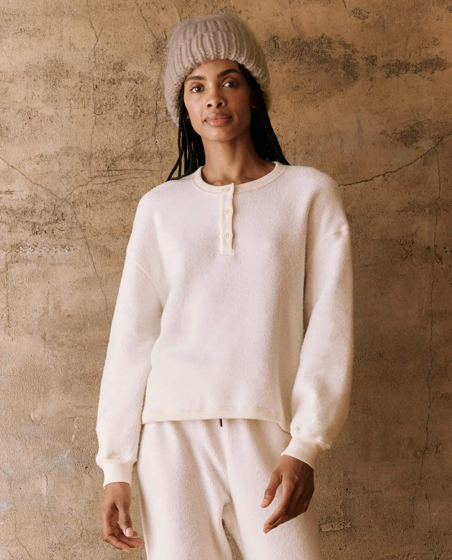 The Fleece Henley Sweatshirt. -- Washed White sold by THE GREAT.