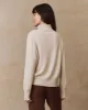 The Cashmere Turtleneck Sweater. -- Ivory sold by THE GREAT.
