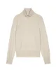 The Cashmere Turtleneck Sweater. -- Ivory sold by THE GREAT.