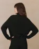The Cashmere Turtleneck Sweater. -- Black sold by THE GREAT.