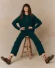 The Cashmere Polo Sweater. -- Alpine sold by THE GREAT.