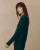 The Cashmere Polo Sweater. -- Alpine sold by THE GREAT.