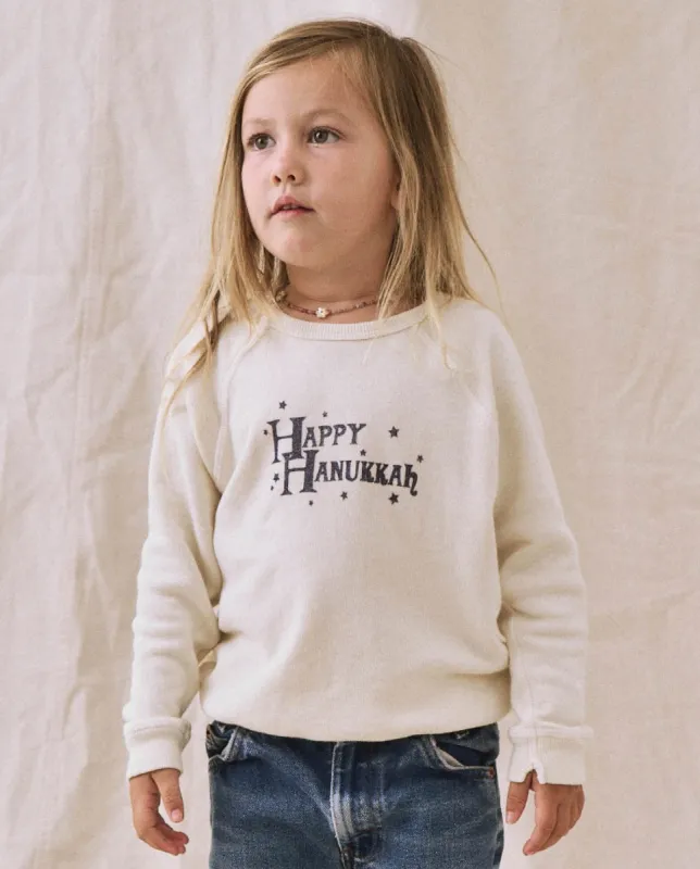 The Little College Sweatshirt. -- Washed White with Hanukkah Graphic sold by THE GREAT.