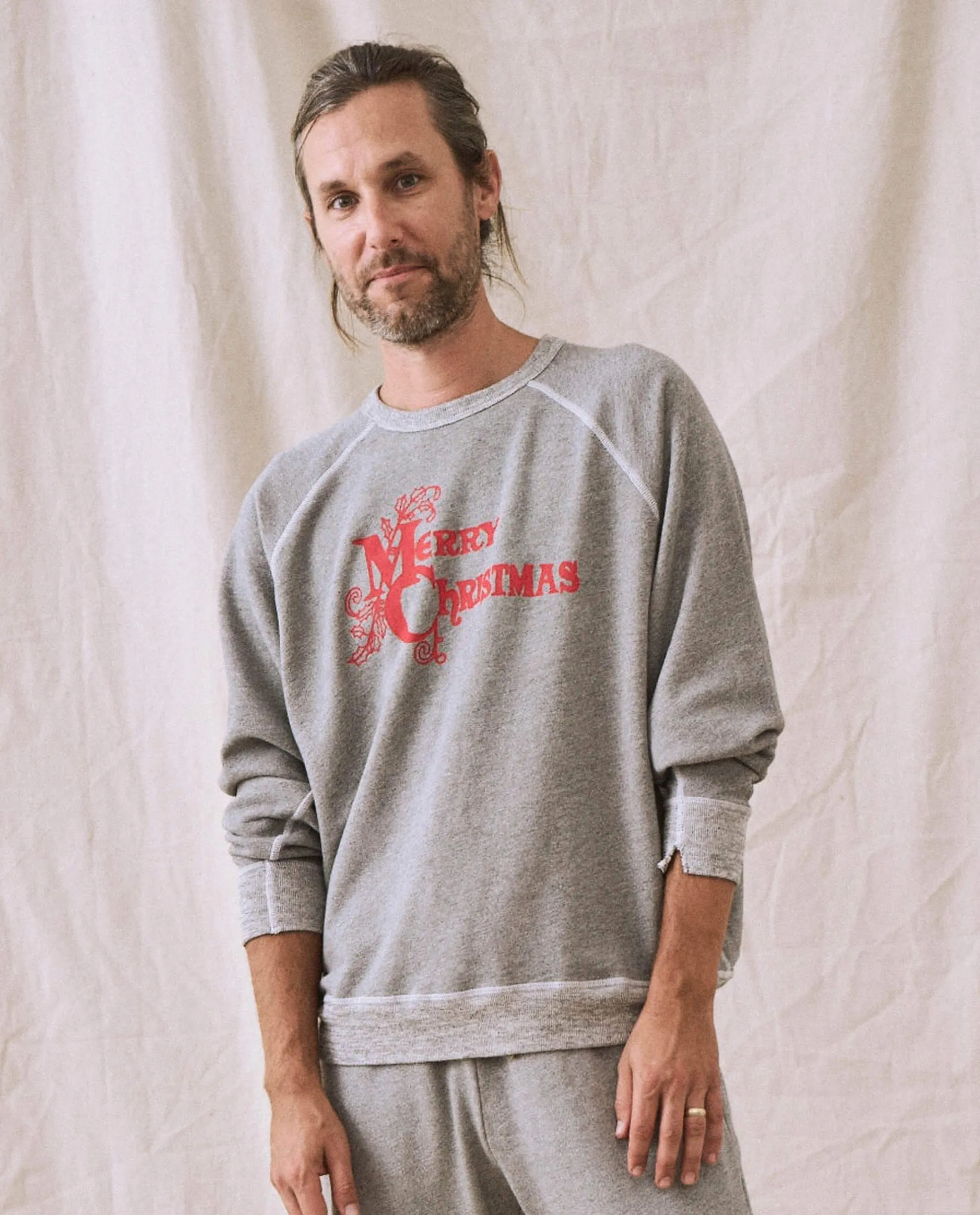 The Men's College Sweatshirt. -- Varsity Grey with Christmas Graphic sold by THE GREAT.