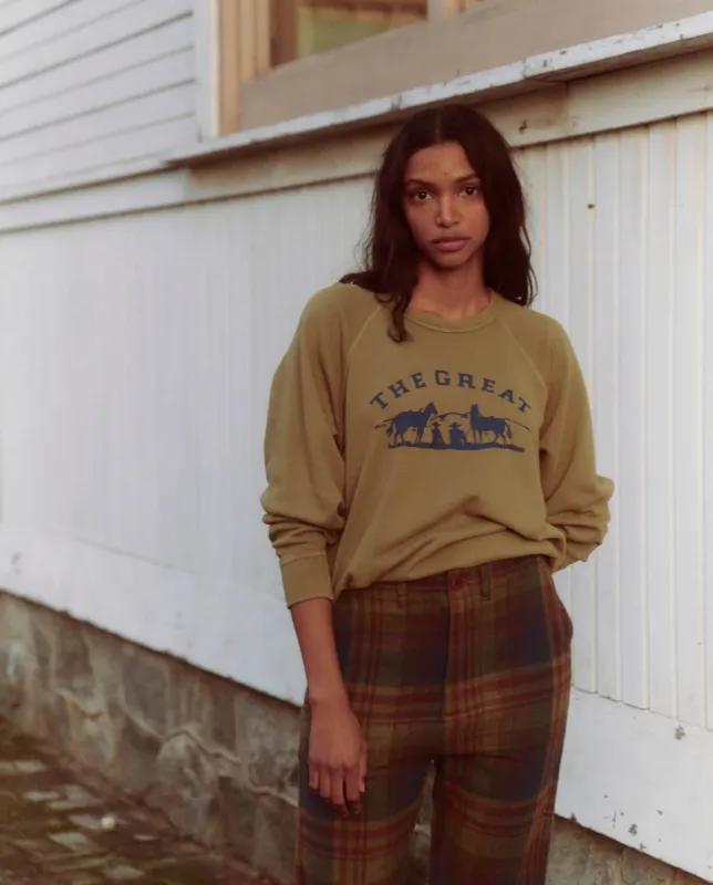 The College Sweatshirt. Graphic -- Washed Fir Green with Gaucho Graphic sold by THE GREAT.