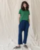 The Slim Tee. Solid -- BOTTLE GREEN sold by THE GREAT.