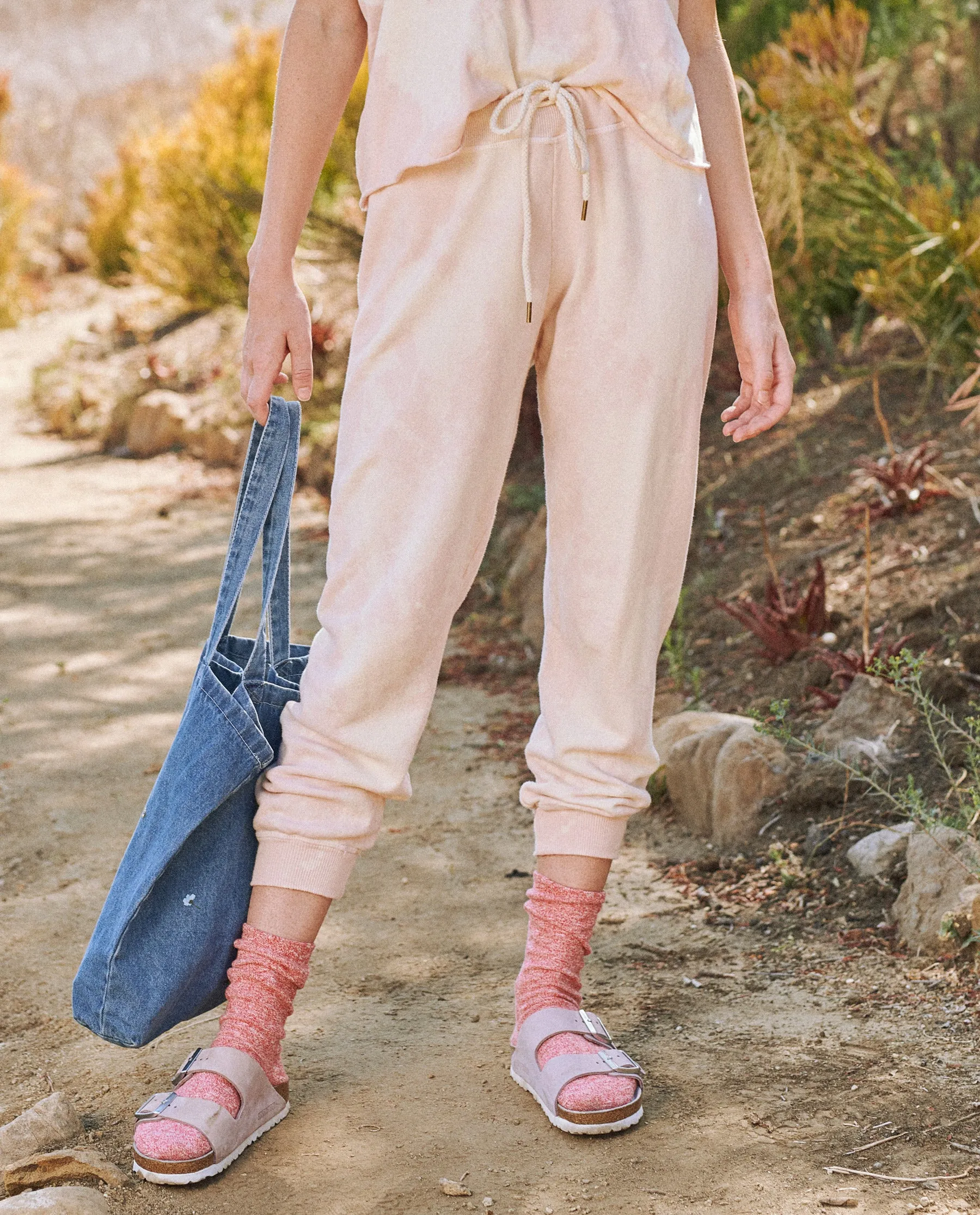 The Cropped Sweatpant. Novelty -- Whisper Pink Cloud Wash sold by THE GREAT.
