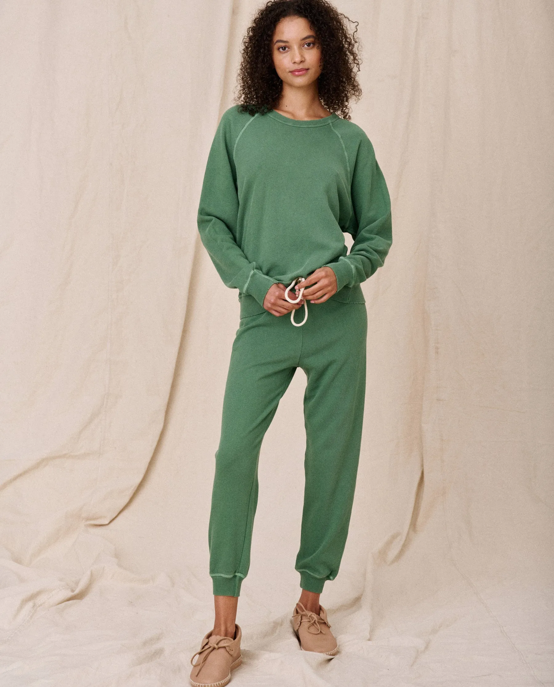 The Cropped Sweatpant. Solid -- Juniper sold by THE GREAT. product image thumbnail 3
