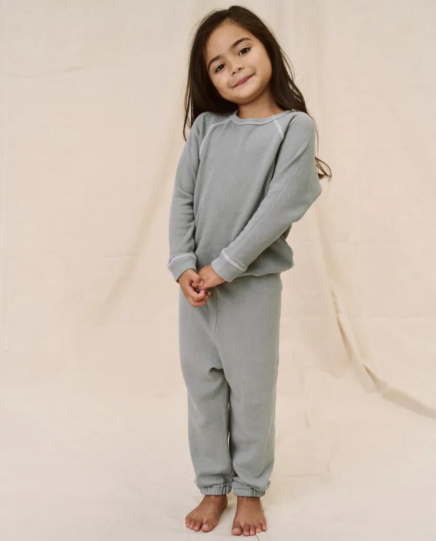 The Little Stadium Sweatpant. Solid -- Dusty Blue sold by THE GREAT.