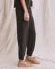 The Jersey Jogger Pant. -- Washed Black sold by THE GREAT.