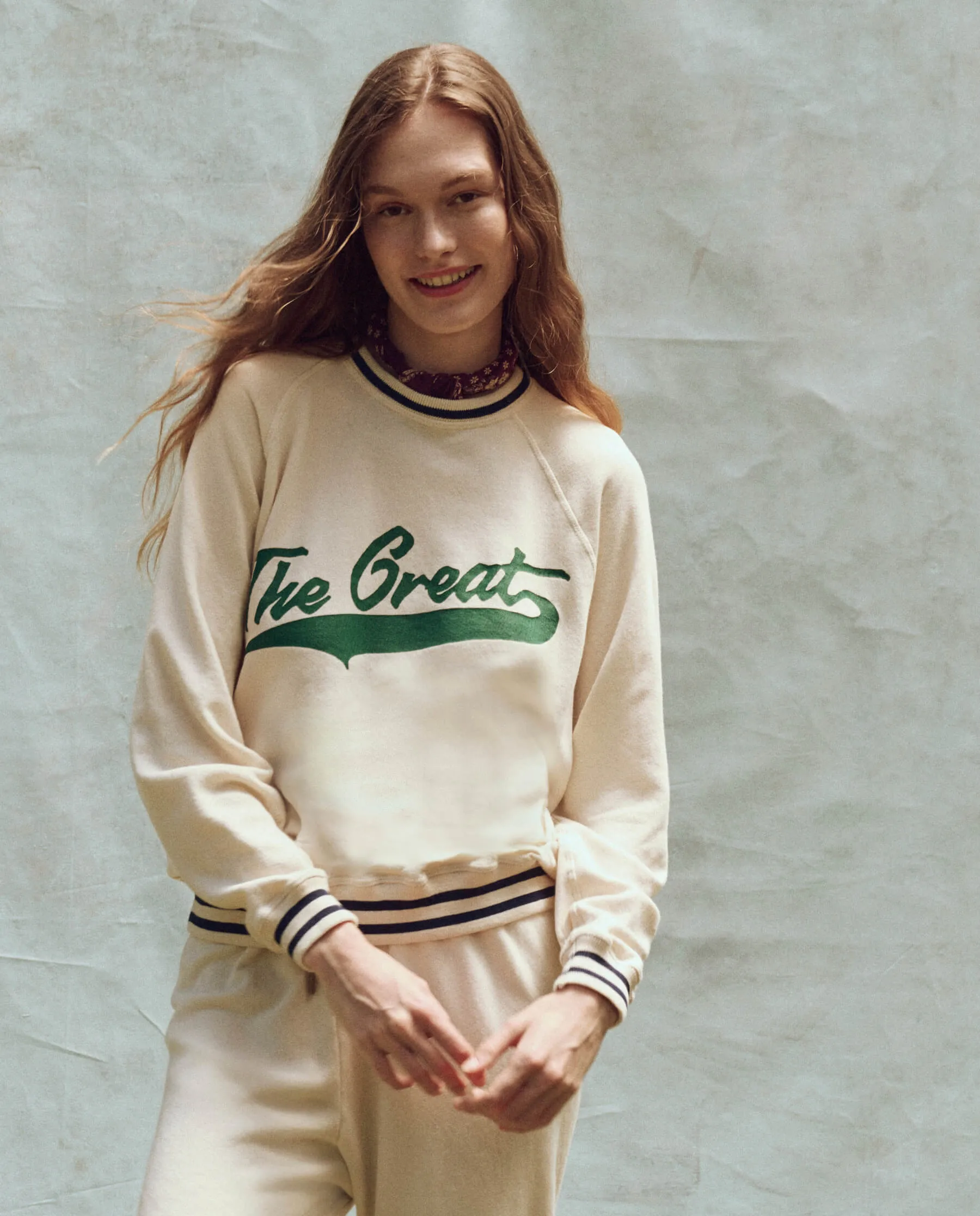 The Varsity College Sweatshirt. -- Washed White with Crest Graphic sold by THE GREAT.