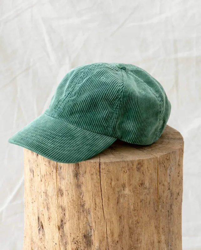 The Baseball Hat. -- Green Grove Corduroy sold by THE GREAT.