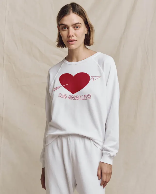 The College Sweatshirt. Graphic -- True White with Los Angeles Heart Graphic sold by THE GREAT.