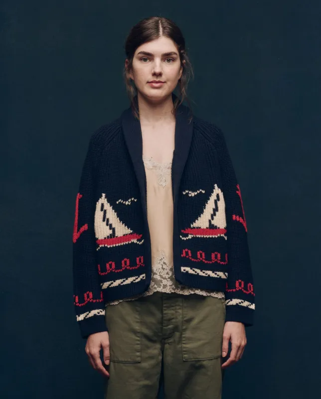 The Sailboat Lodge Cardigan. -- Dark Navy sold by THE GREAT.