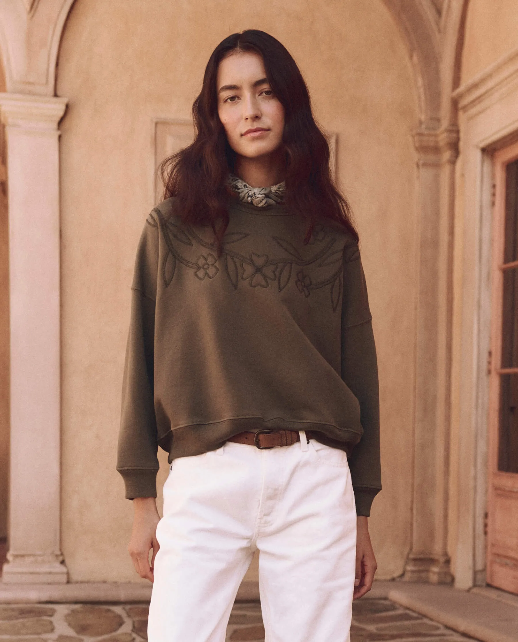 The Floral Applique Teammate Sweatshirt. -- Army sold by THE GREAT.