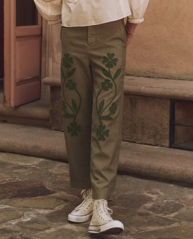 The Floral Applique Admiral Pant. -- Tonal Army sold by THE GREAT.
