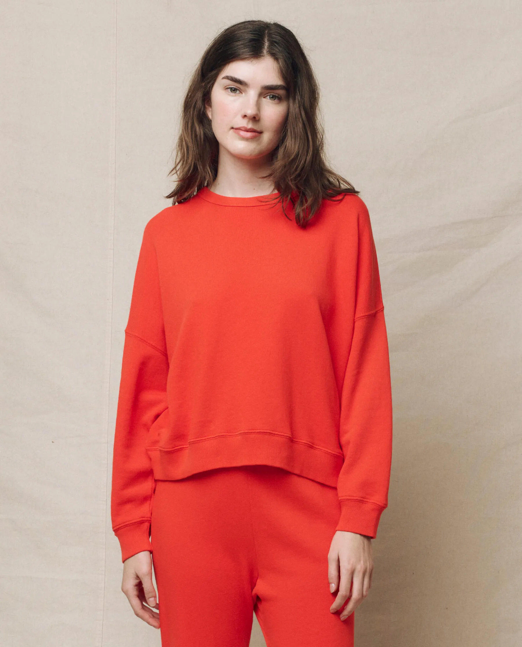 The Teammate Sweatshirt. Solid -- Tart sold by THE GREAT.