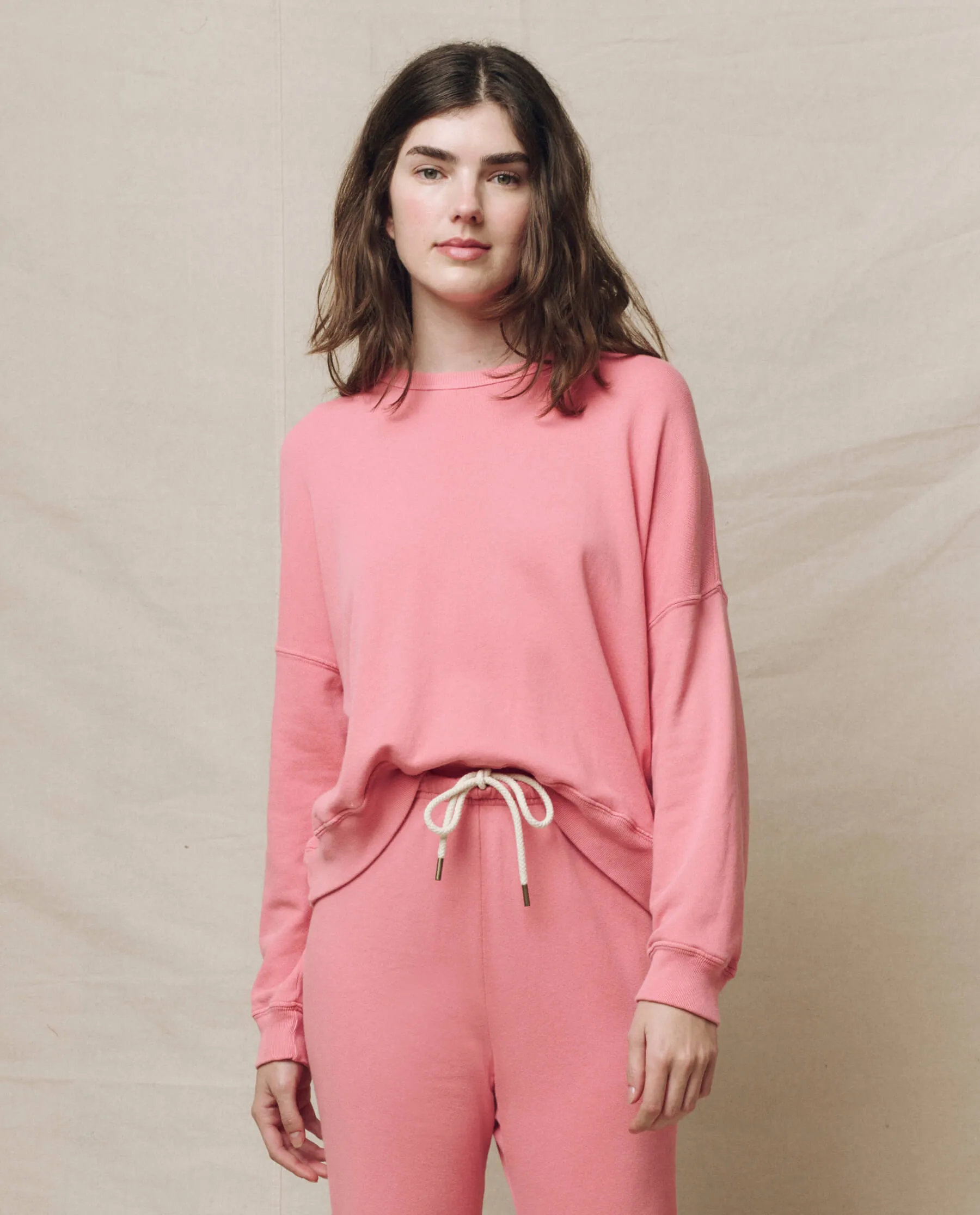 The Teammate Sweatshirt. Solid -- Confetti sold by THE GREAT.