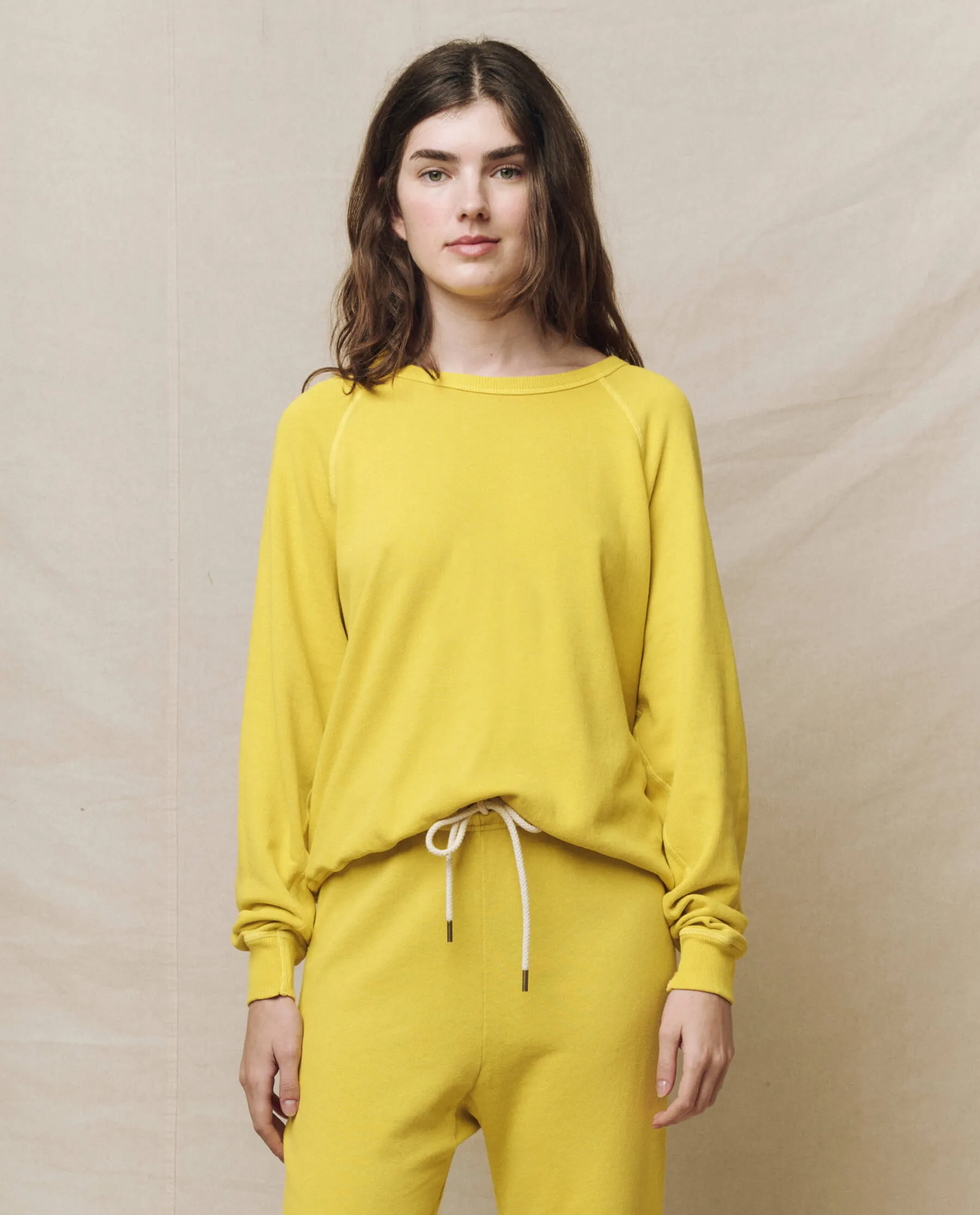 The College Sweatshirt. Solid -- Daffodil sold by THE GREAT.