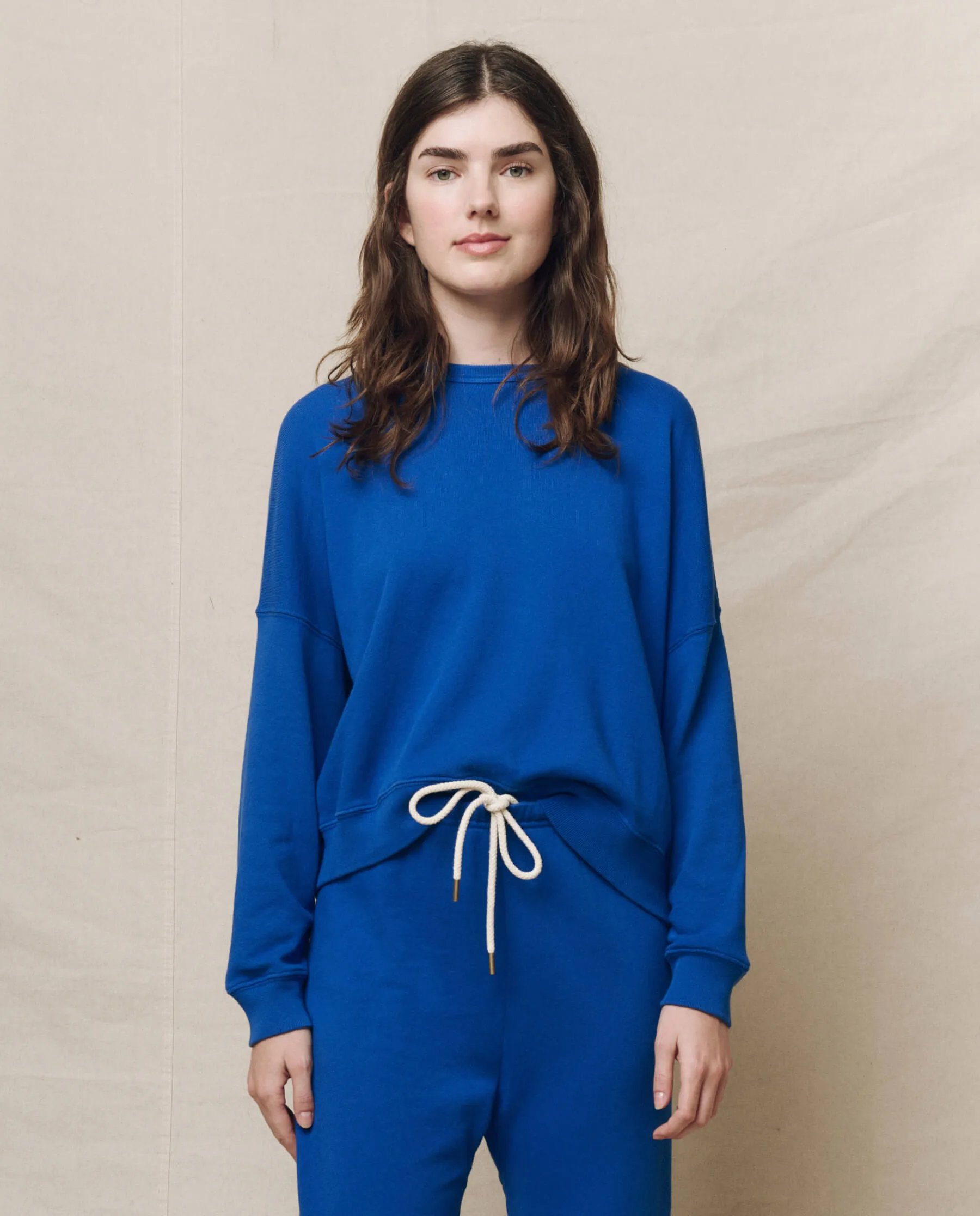 The Teammate Sweatshirt. Solid -- Bright Cobalt sold by THE GREAT.