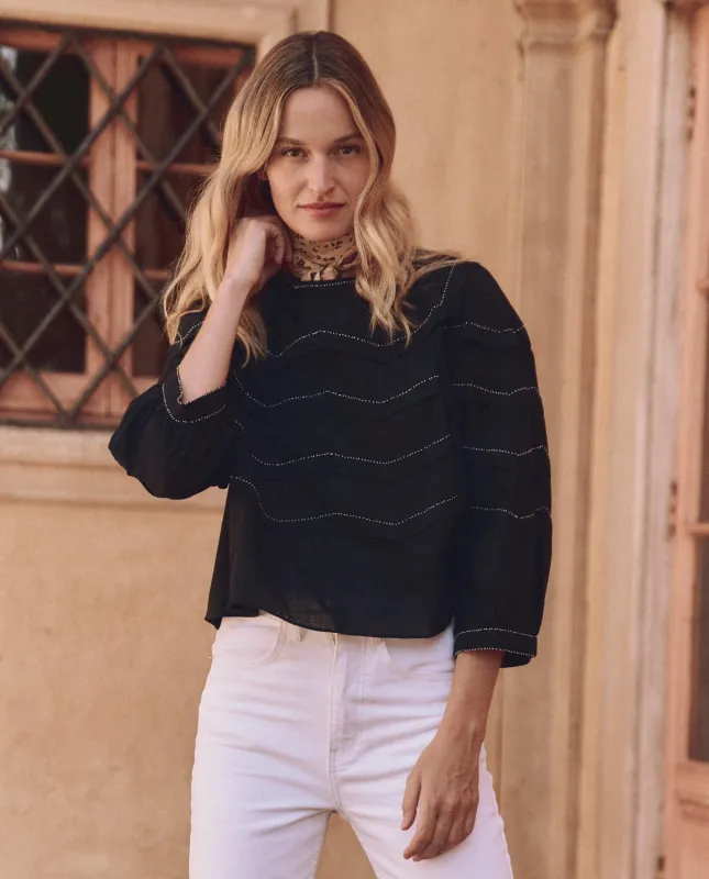 The Beaded Chevron Top. -- Black sold by THE GREAT.