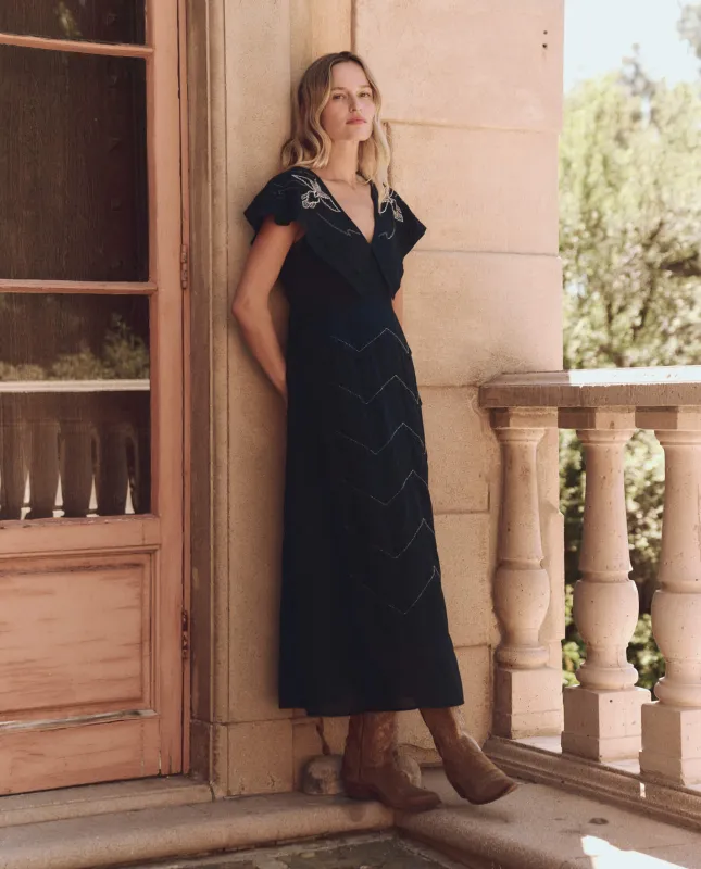 The Beaded Partridge Dress. -- Black sold by THE GREAT.