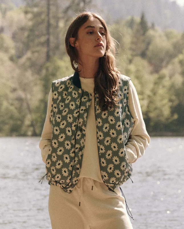 The Reversible Ultra Light Down Vest. -- Falling Daisy and Cream sold by THE GREAT.