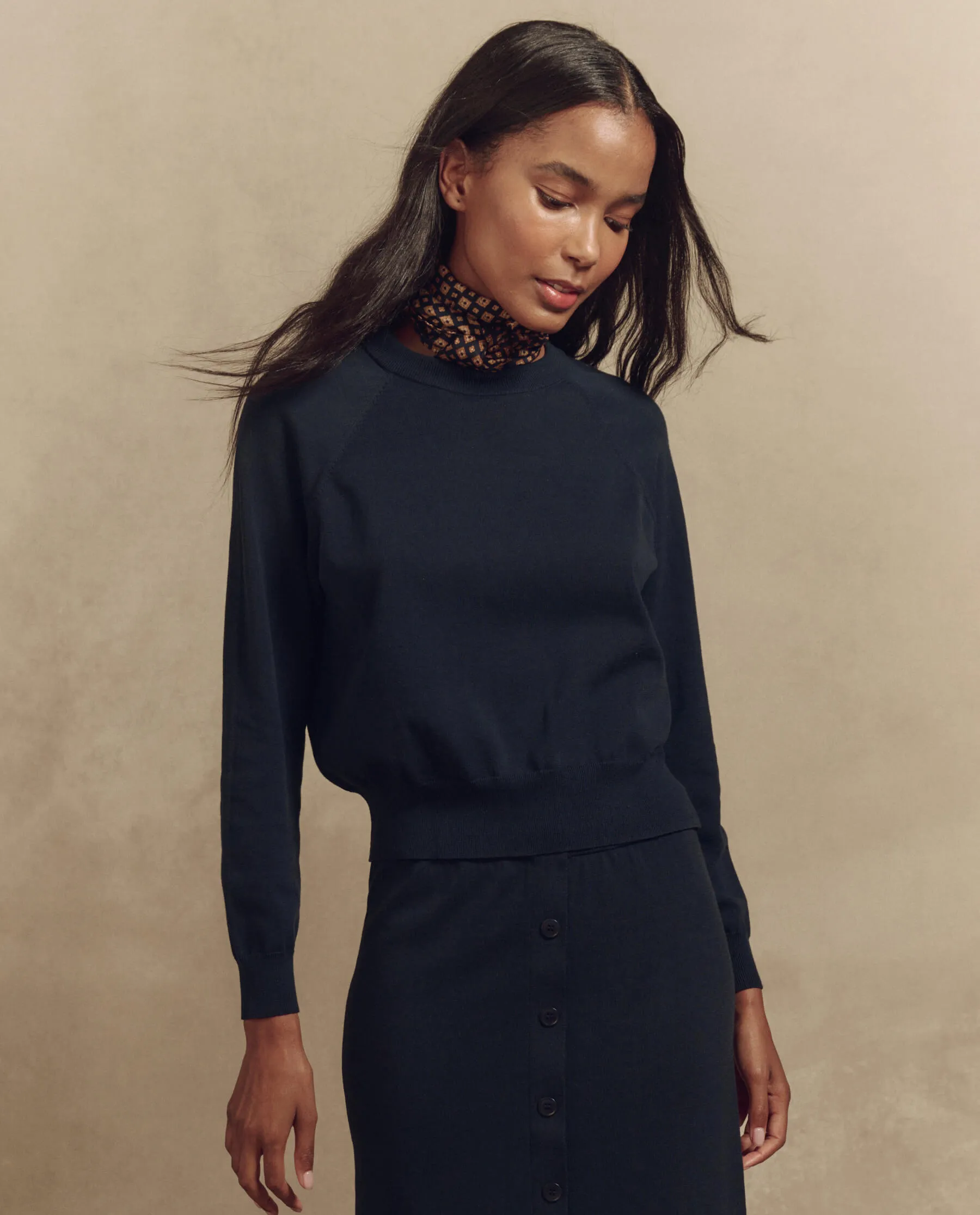 The Crew Neck Sweater. -- Dark Navy sold by THE GREAT.