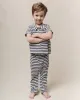 The Little Lacrosse Polo. -- Vintage Blue Stripe sold by THE GREAT.