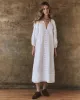 The Bodega Dress with Studs. -- White sold by THE GREAT.