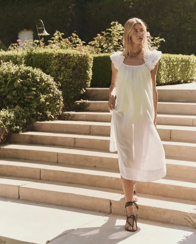 The Ruffle Coverup. -- White sold by THE GREAT.