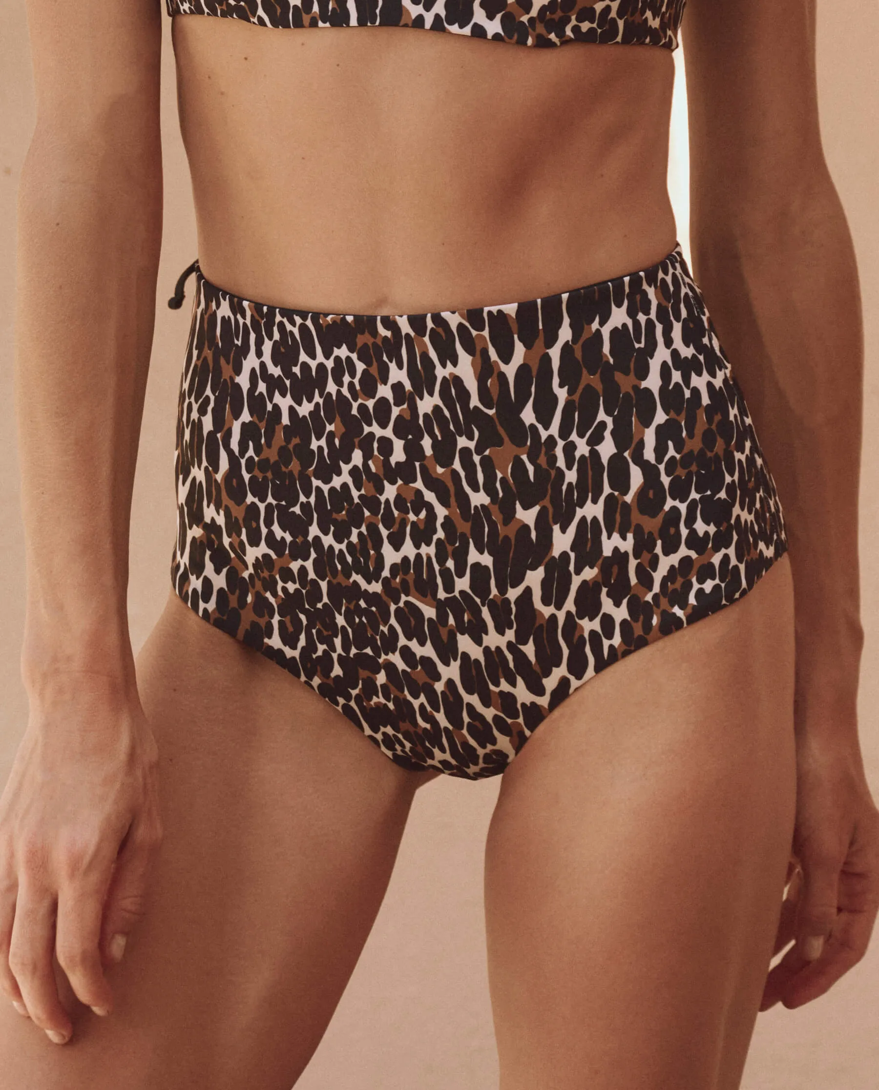 The Reversible Mid Rise Brief. -- Leopard and Black sold by THE GREAT.