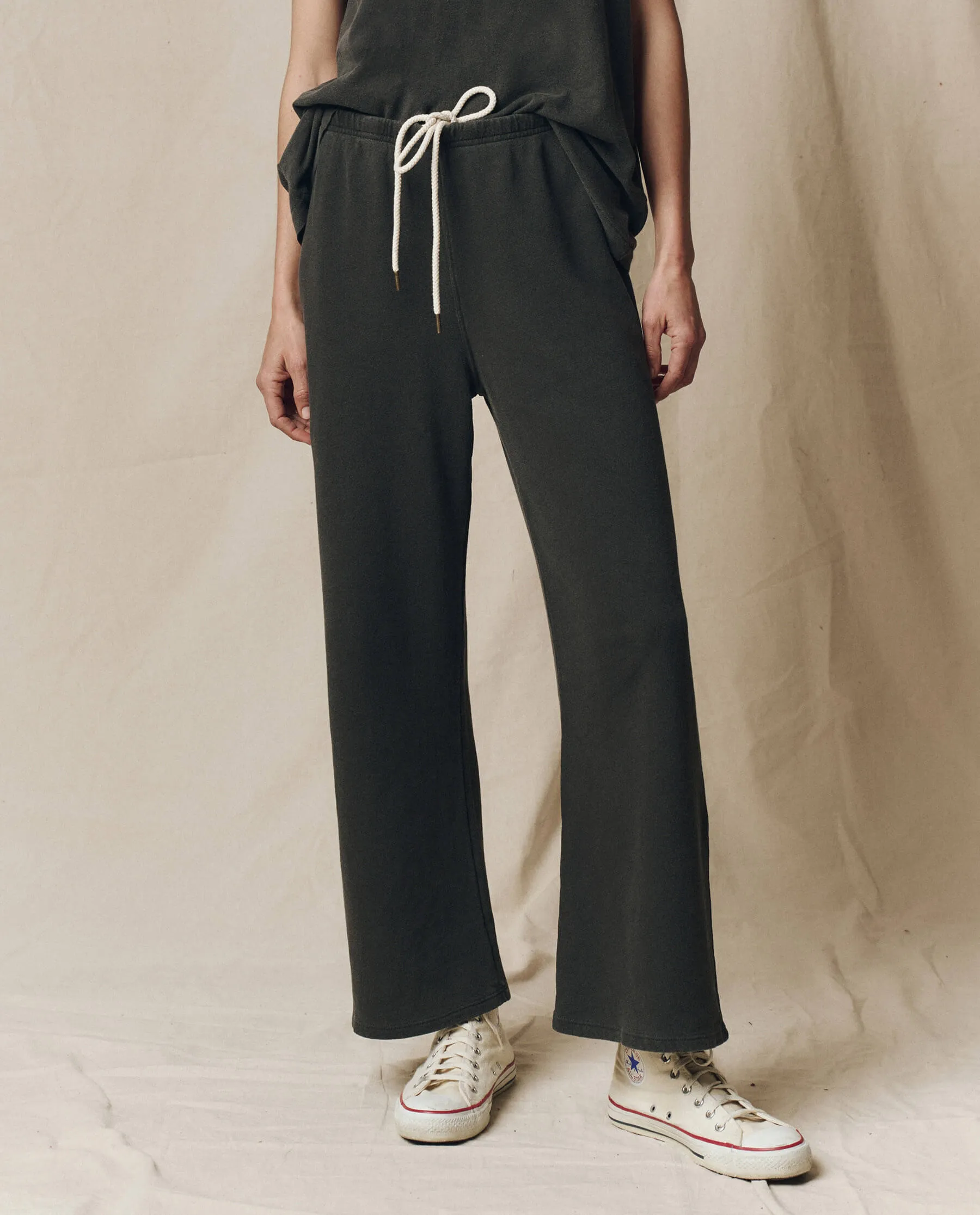 The Lap Sweatpant. Solid -- Washed Black sold by THE GREAT.