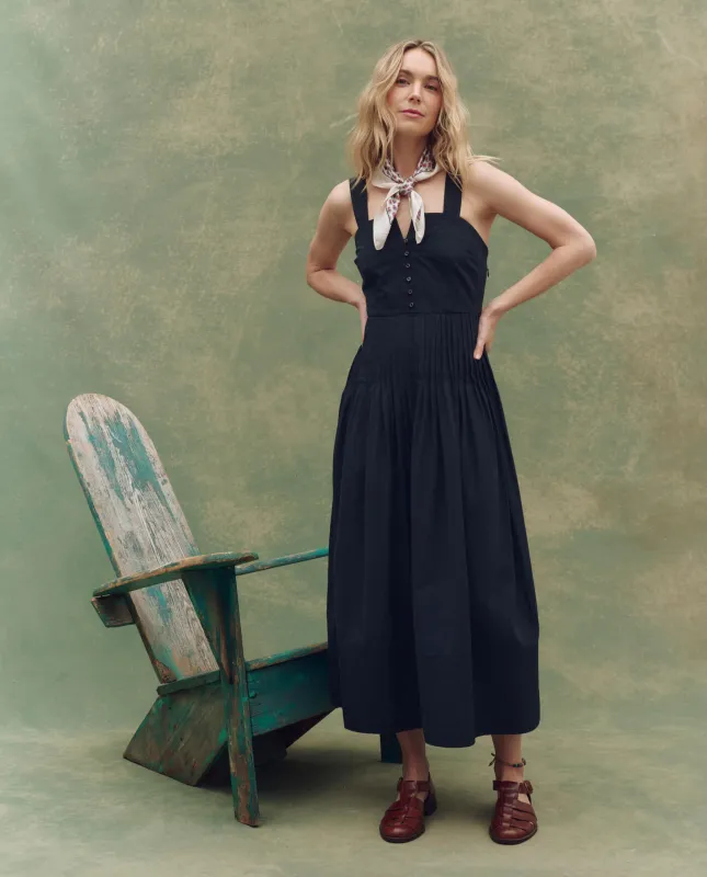 The Day Break Dress. -- Black sold by THE GREAT.