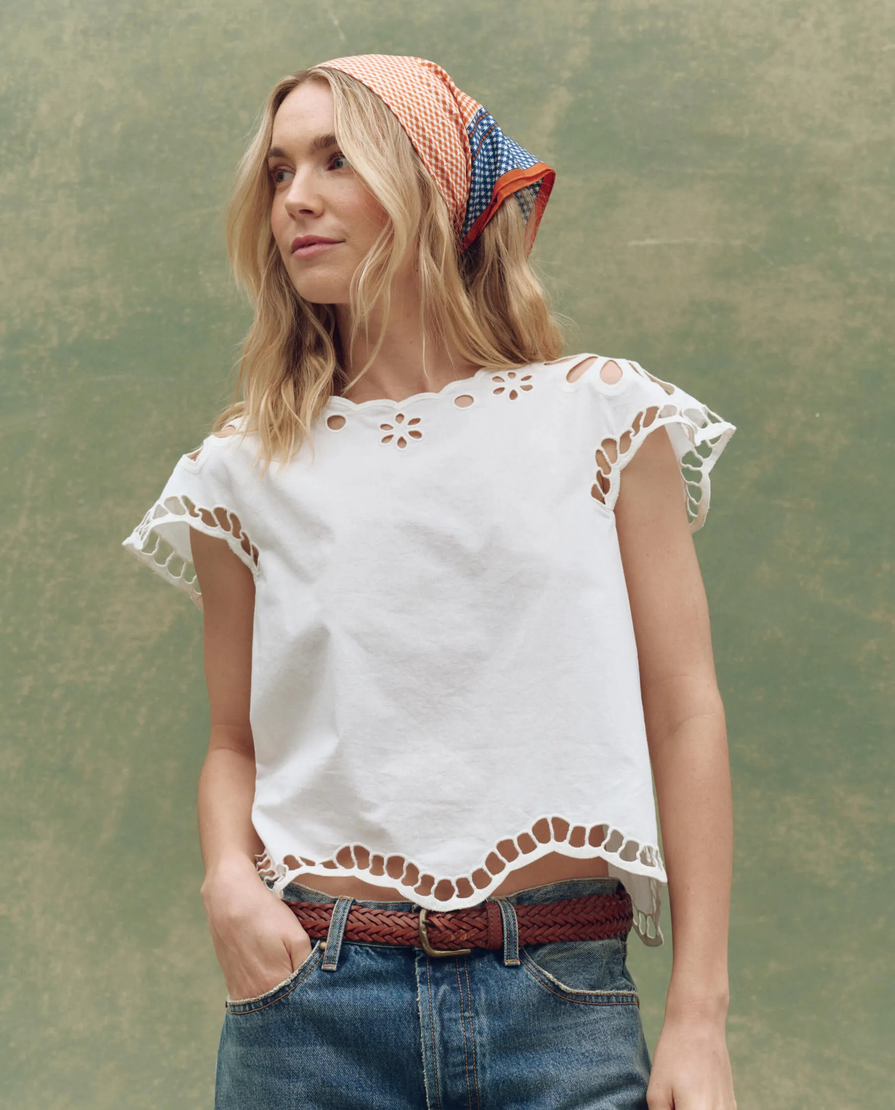 The Super Bloom Eyelet Top. -- White sold by THE GREAT.