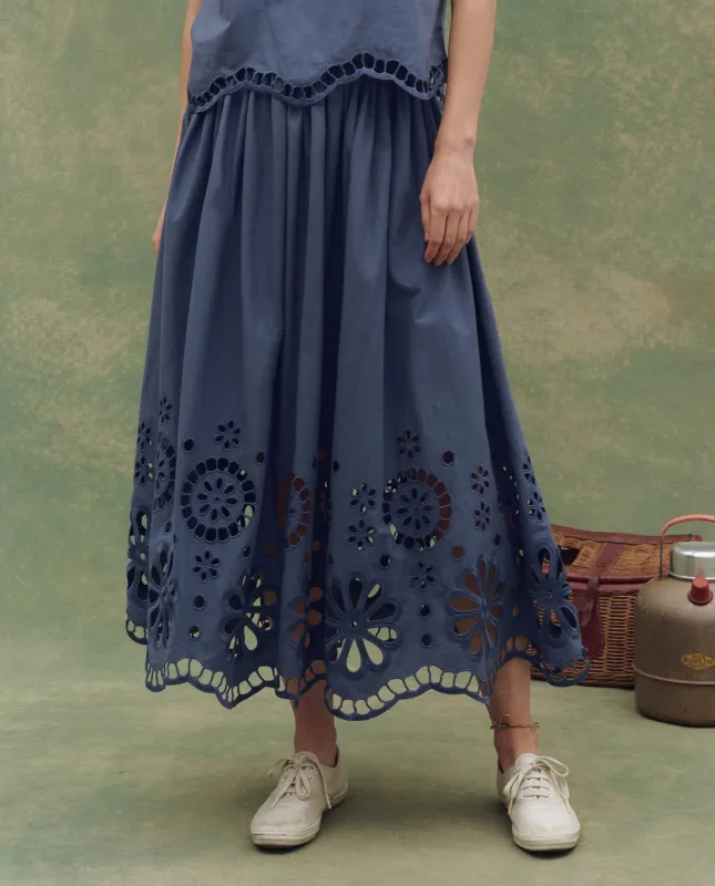 The Super Bloom Eyelet Skirt. -- Vintage Blue sold by THE GREAT.