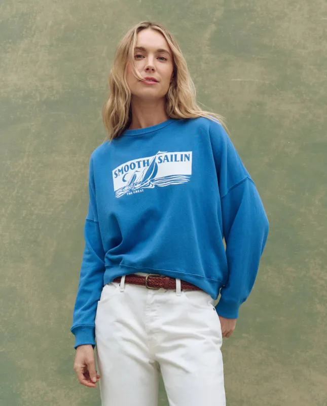 The Teammate Sweatshirt. Graphic -- Pool Blue with Smooth Sailin Graphic sold by THE GREAT.