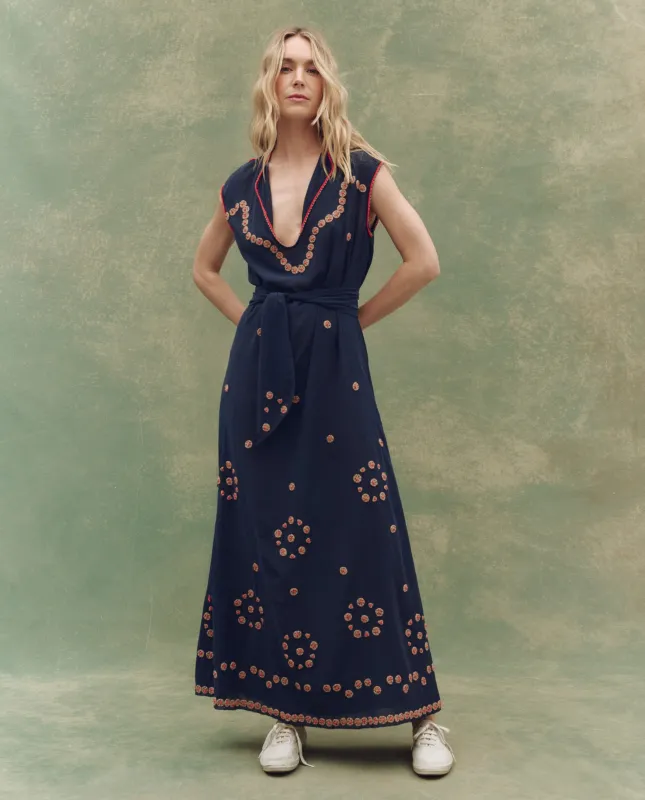 The Beaded Corridor Dress. -- Navy sold by THE GREAT.