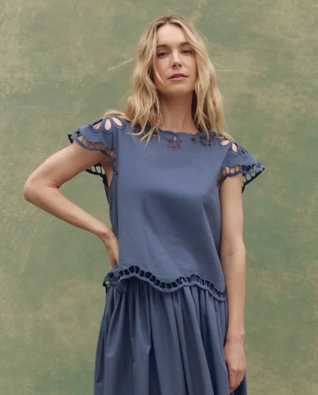 The Super Bloom Eyelet Top. -- Vintage Blue sold by THE GREAT.