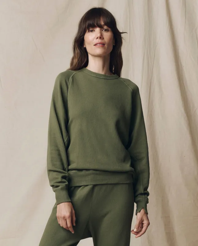 The College Sweatshirt. Solid -- Heritage Army sold by THE GREAT.