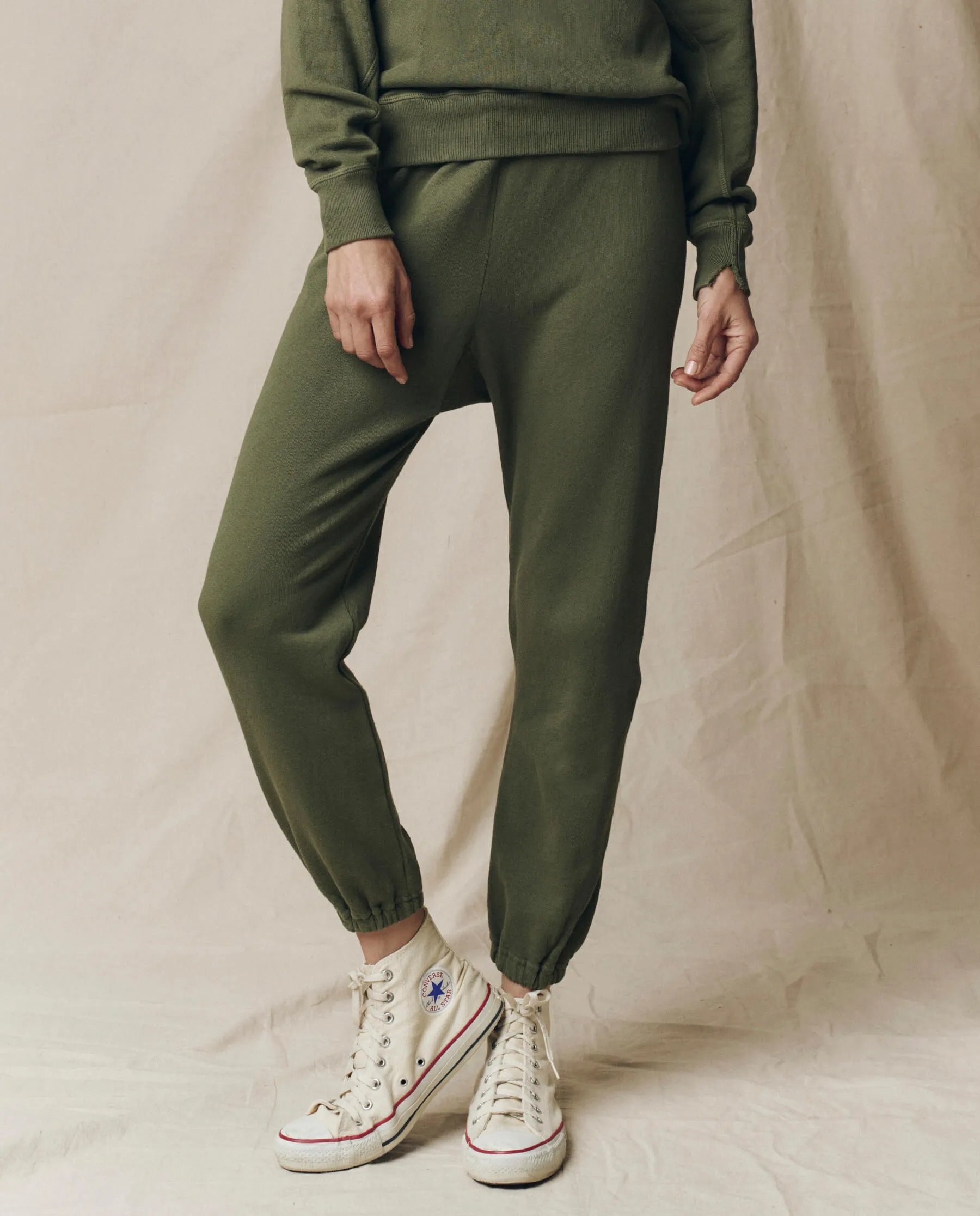 The Stadium Sweatpant. Solid -- Heritage Army sold by THE GREAT.