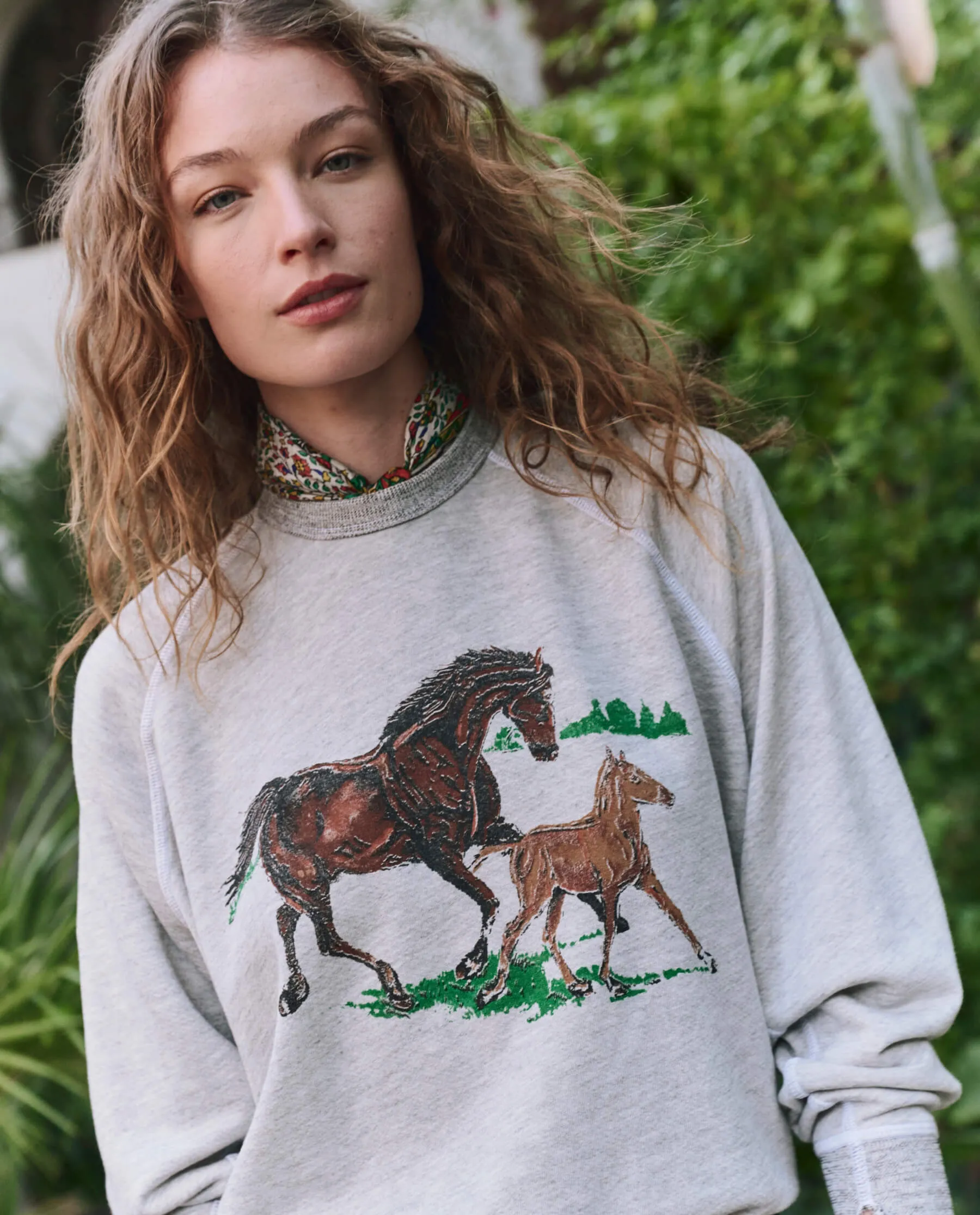 The College Sweatshirt. Graphic -- Soft Heather Grey with Running Horses sold by THE GREAT.