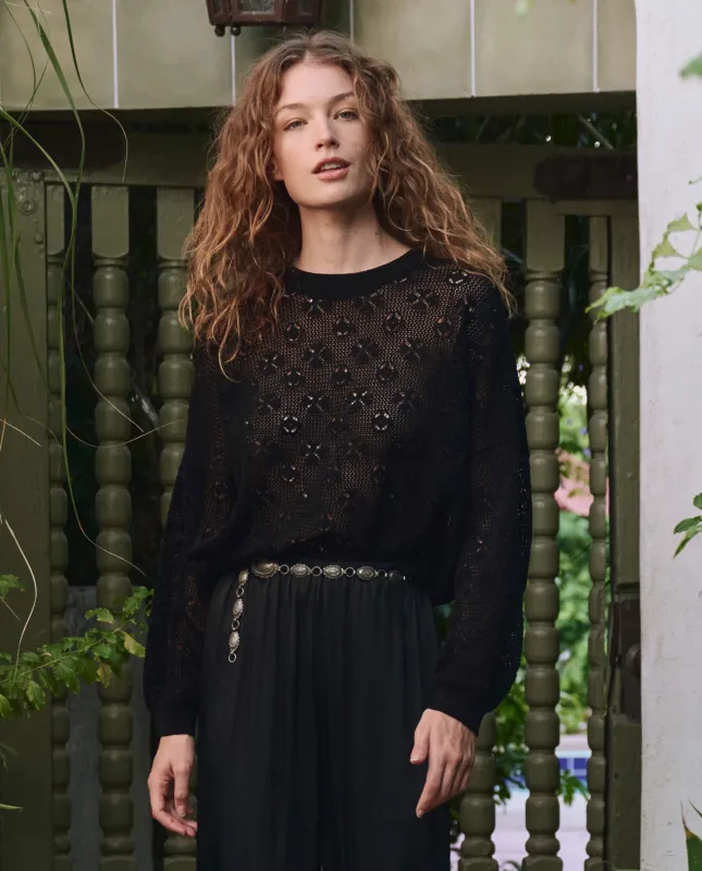 The Crochet Pullover. -- Black sold by THE GREAT.