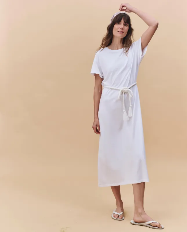 The Boxy Tee Dress. -- True White sold by THE GREAT.