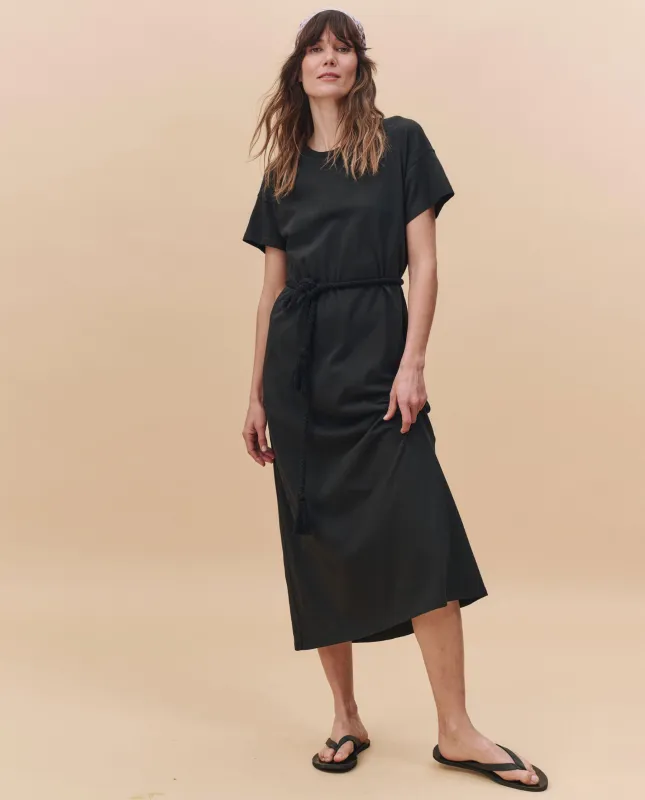 The Boxy Tee Dress. -- Almost Black sold by THE GREAT.