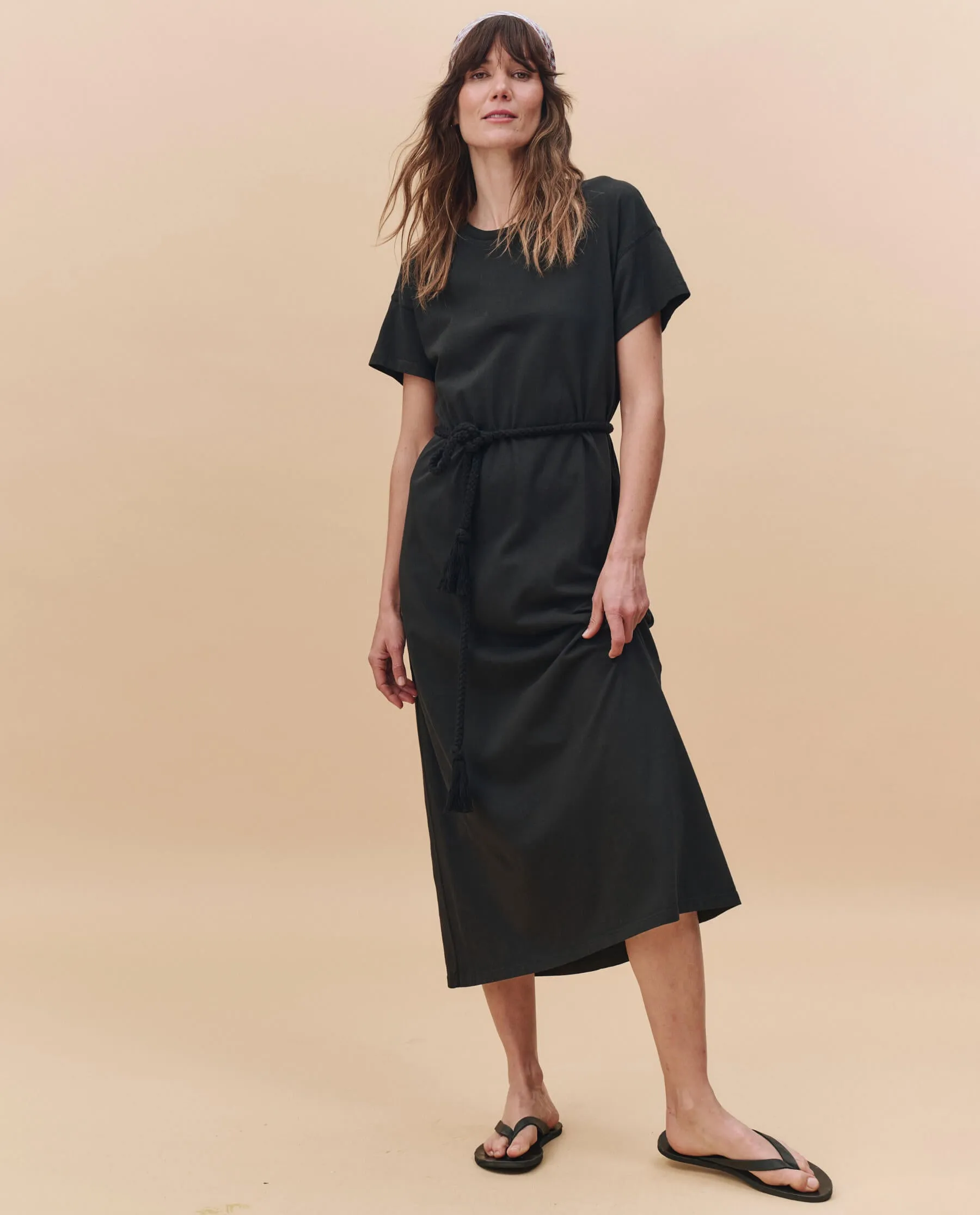 The Boxy Tee Dress. -- Almost Black sold by THE GREAT.